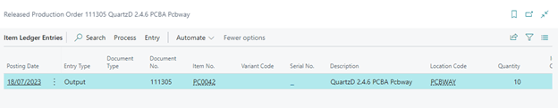 Screenshot of Capacity Ledger Entries in Business Central showing a posted production entry for a Work Center with an output quantity.