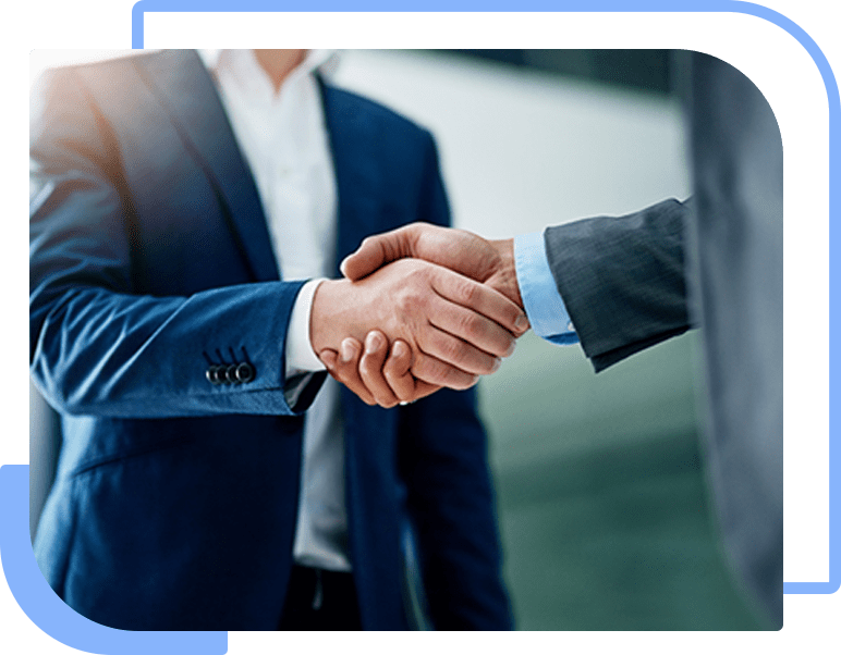 Two business professionals shaking hands signifying a mutually beneficial relationship between a Salesforce partner and a Salesforce customer.
